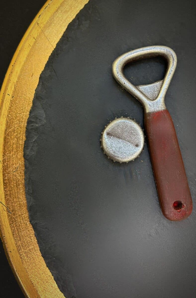 Bottle opener with crown cap